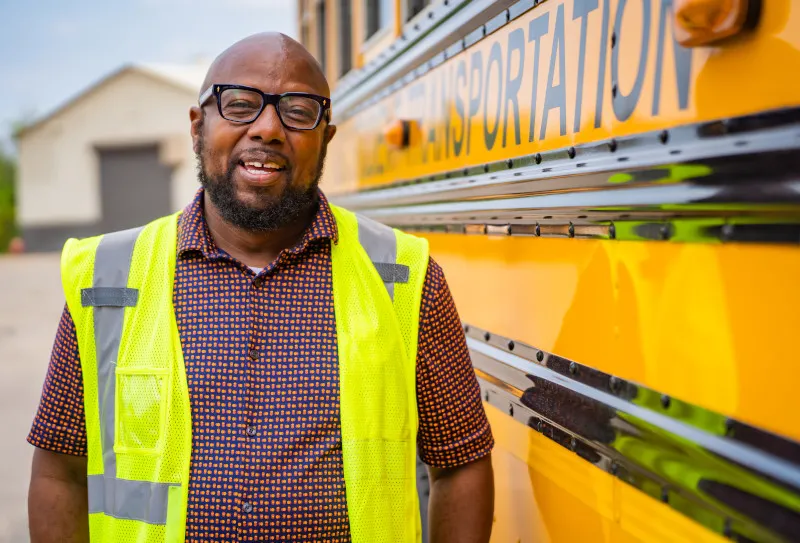 Black man by the bus