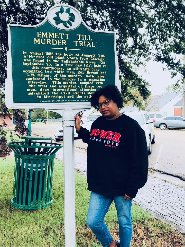 Valeria Hawkins in front of Emmett Till sign