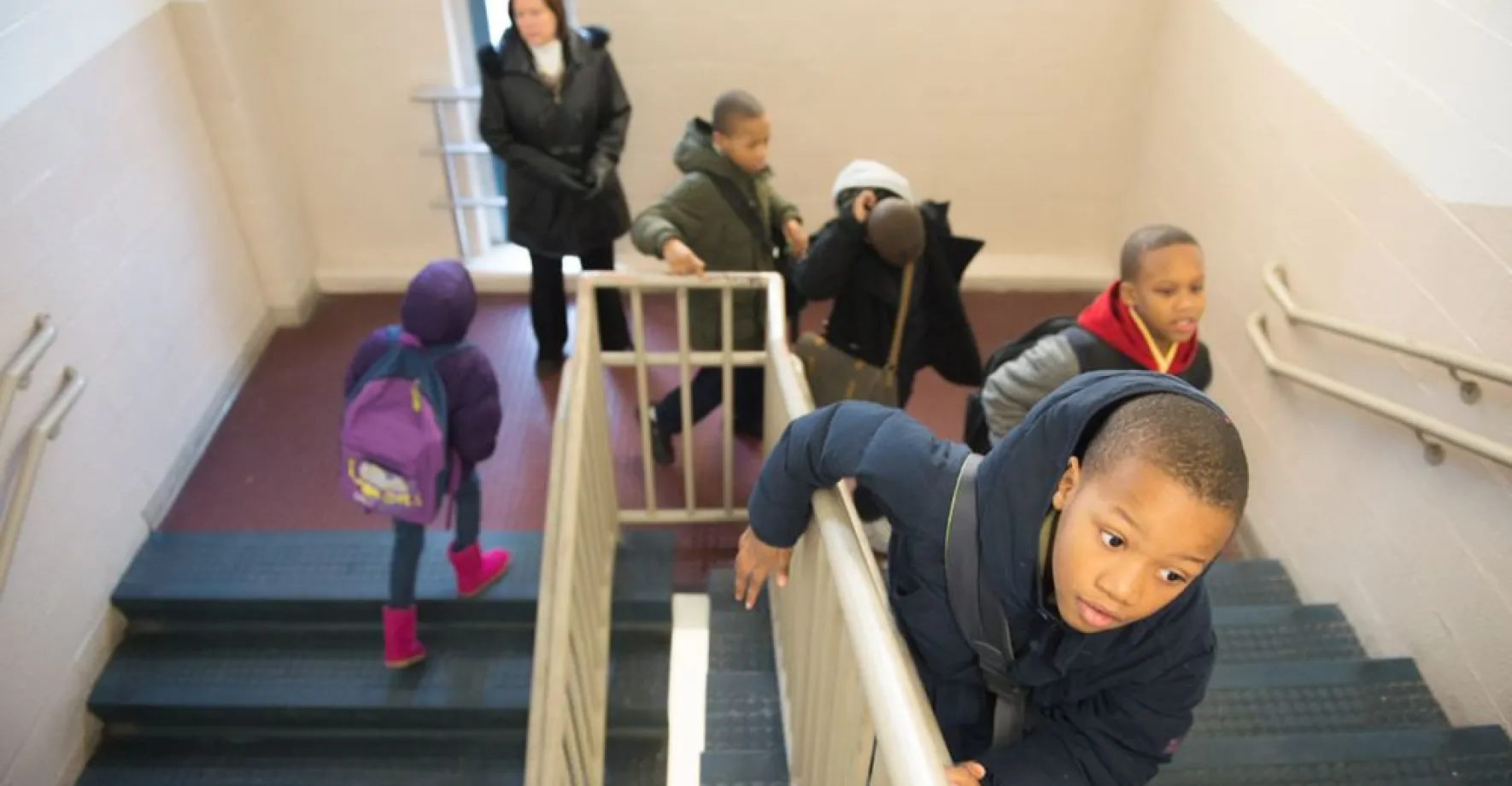 Students going up the stairs