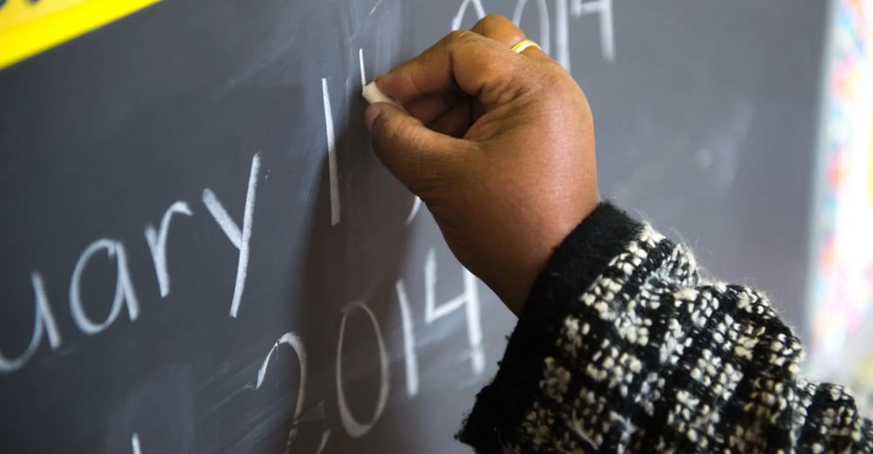 Mrs. Mile on the chalkboard