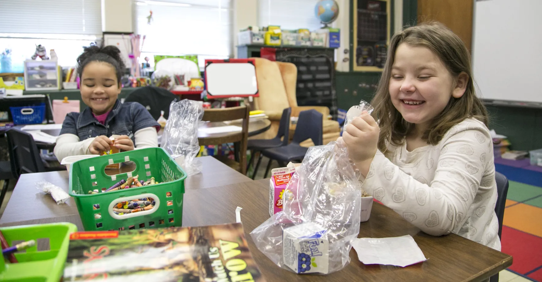 girls eating breakfast in their classroom