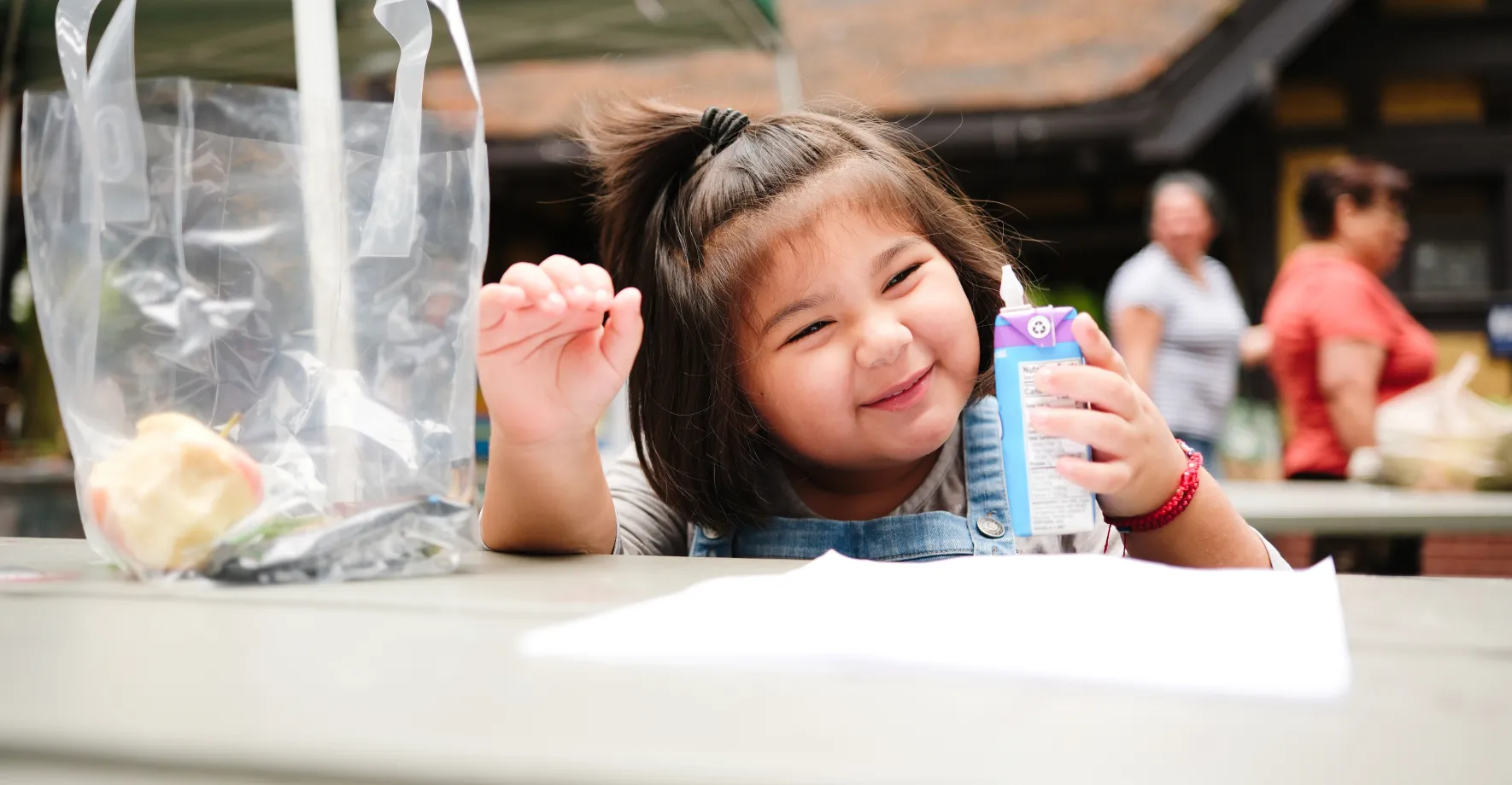 Smiling girl outside in summer