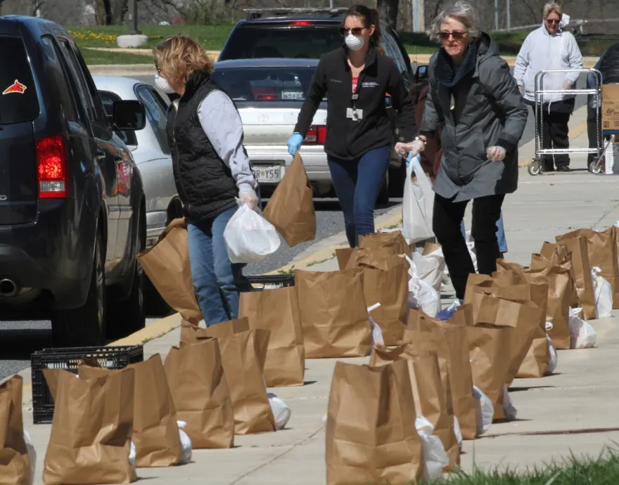 Parents picking up meals near Baltimore