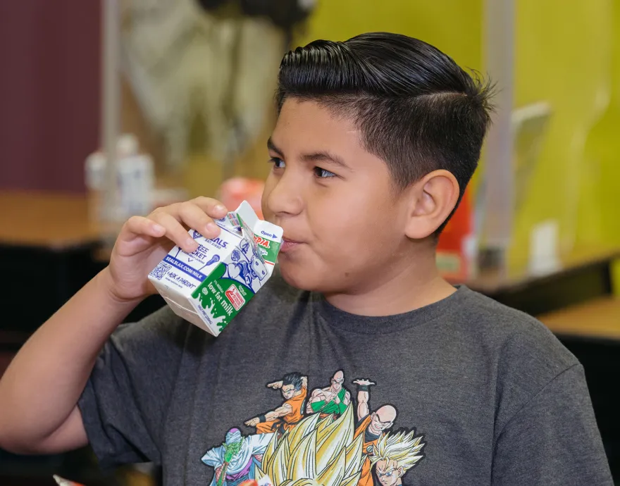 Student enjoys a healthy school meal.