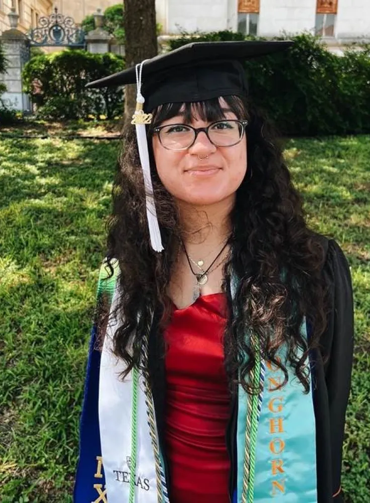 Stephanie Nieto. Young woman in graduation gown