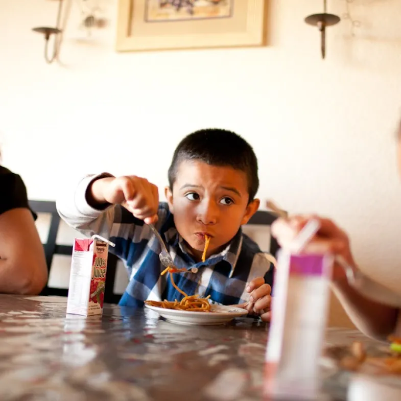 Kids eating dinner