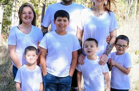 Family of 7 all wearing white