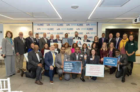 group of Mayors holding signs