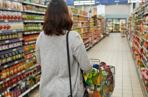 Woman shopping in grocery store